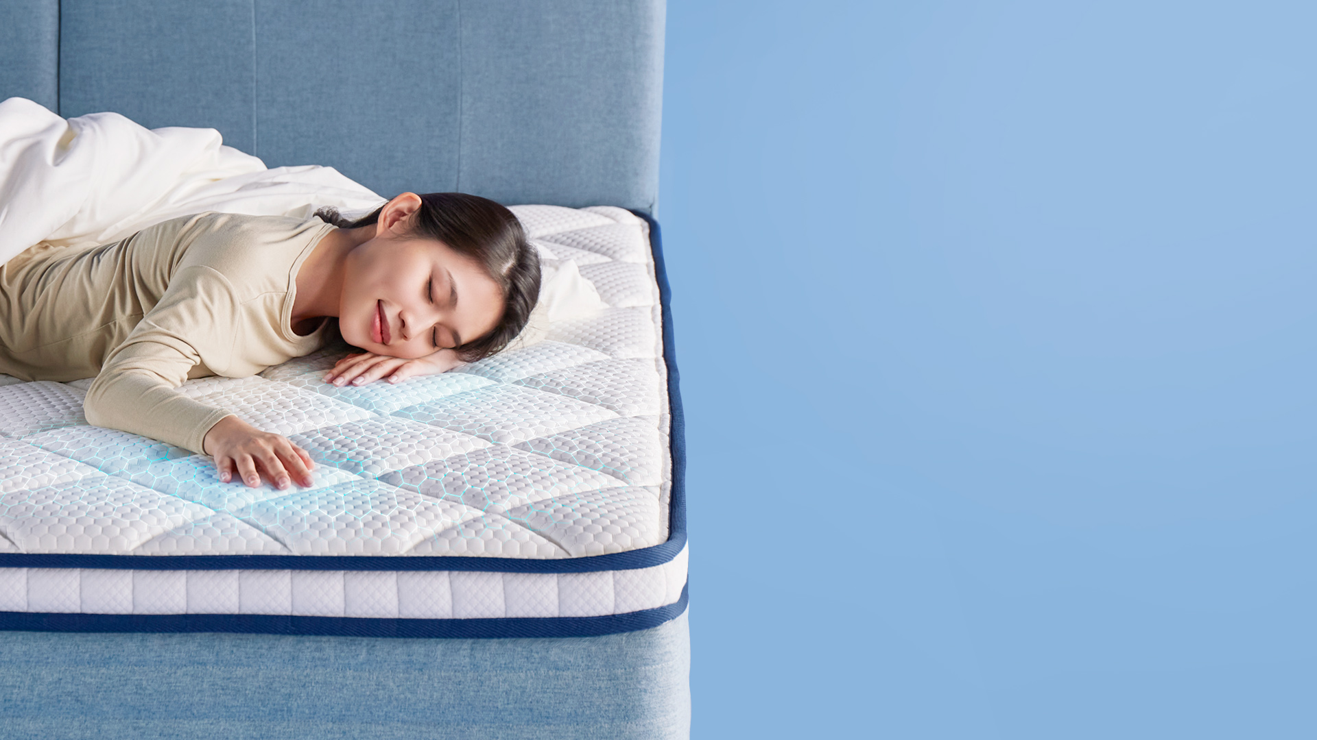 Woman sleeping comfortably on the cooling fabric ticking of the Mattress Ecolite