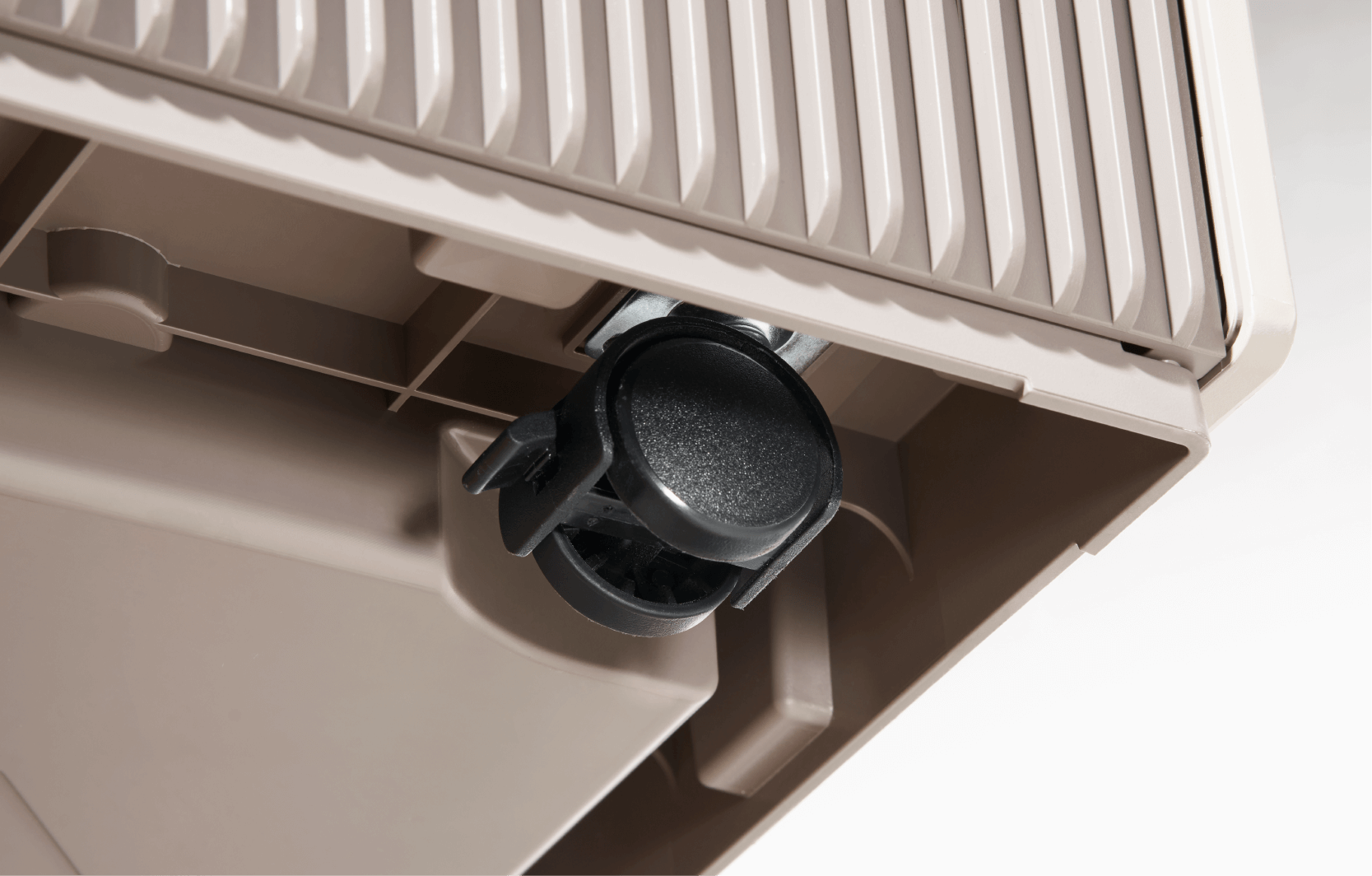 Close-up of a built-in wheel beneath the Coway Atrium