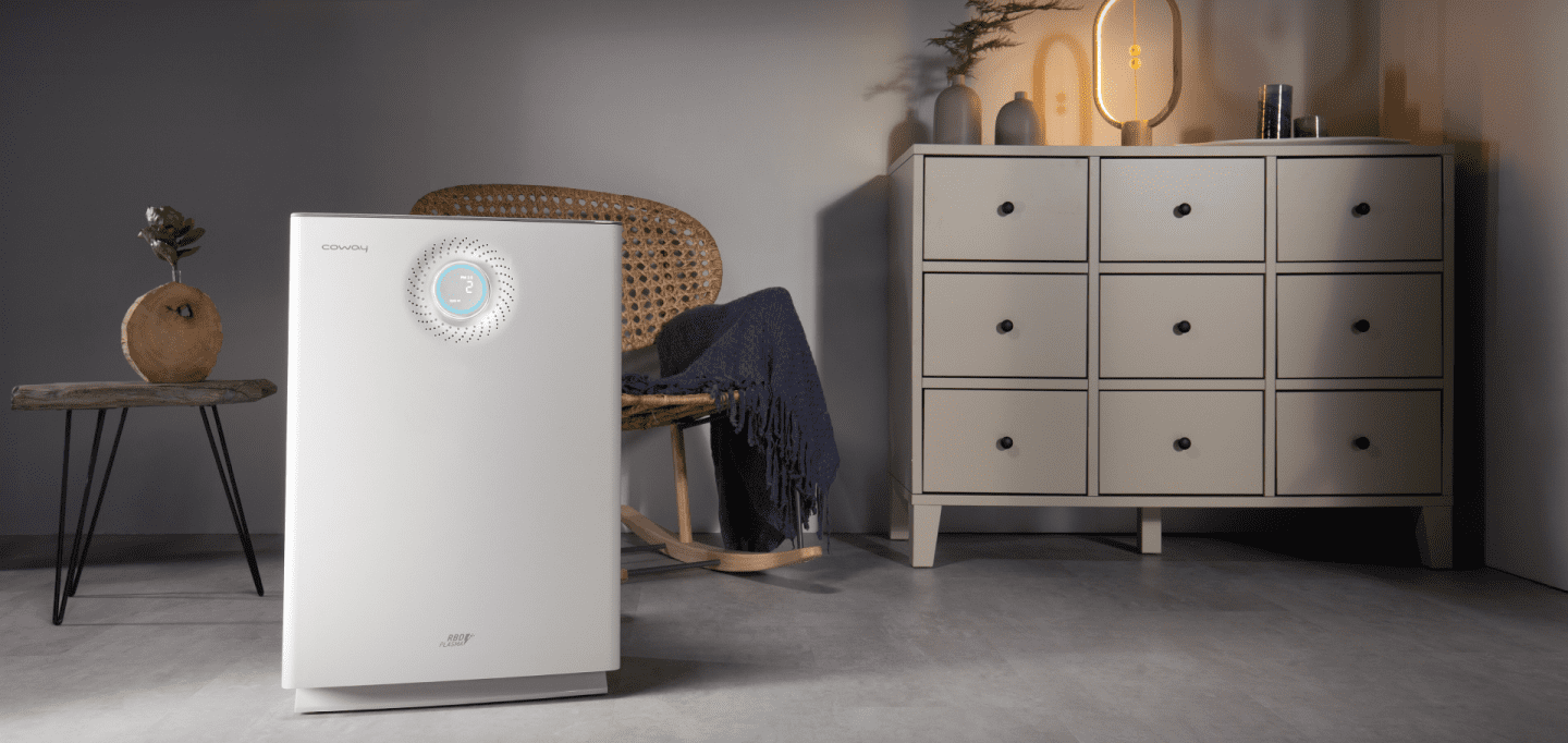 Coway Lombok III air purifier in a calm, light-filled living room